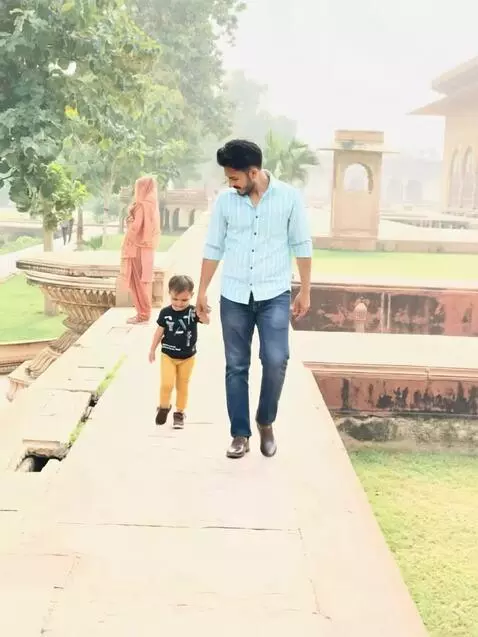 AI Video from prompt: Make them walk together like father daughter