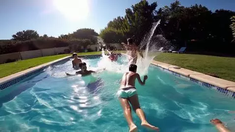 AI Video from prompt: Playing in the pool