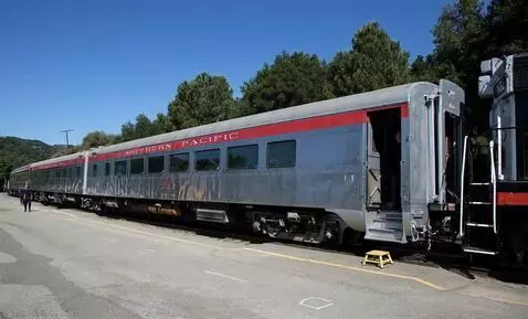 AI Video from prompt: A train is waiting for the people to get on boar