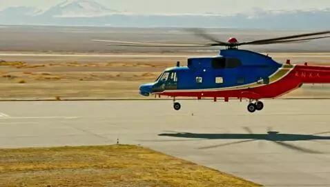 AI Video from prompt: A Soviet blue and red Mi-8 helicopter lands at a