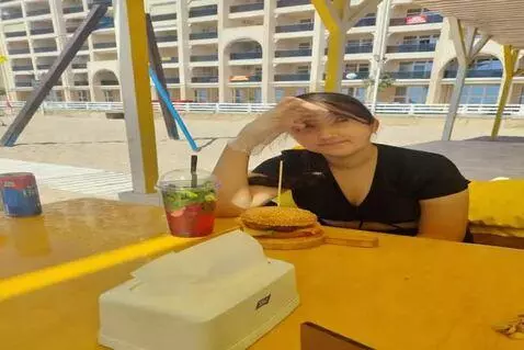 AI Video from prompt: The girl gets up from her chair and flies to the