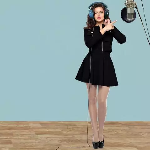 AI Video from prompt: A young woman in a recording studio. Light nylon