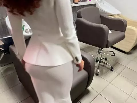 AI Video from prompt: A 35-year-old European woman with curly red hair