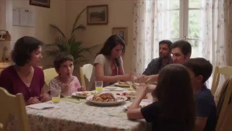 AI Video from prompt: A montage of a woman cooking, helping kids with 