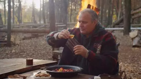 AI Video from prompt: Огненный раскалённый шар разрезают на пополам но