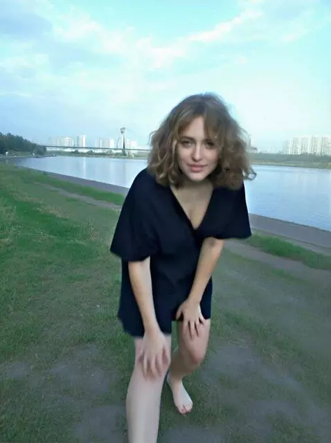 AI Video from prompt: A girl stands up and poses full-length in front 