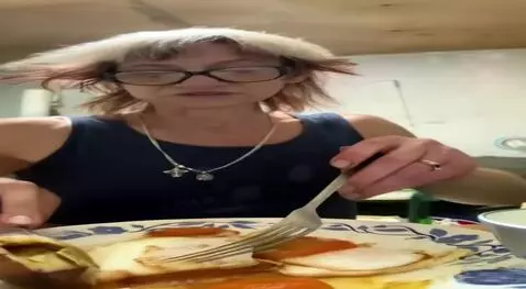 AI Video from prompt: Громко смеётся и показывает язык