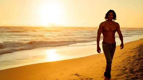 AI Video from prompt: A dark-haired man with long hair, handsome and a