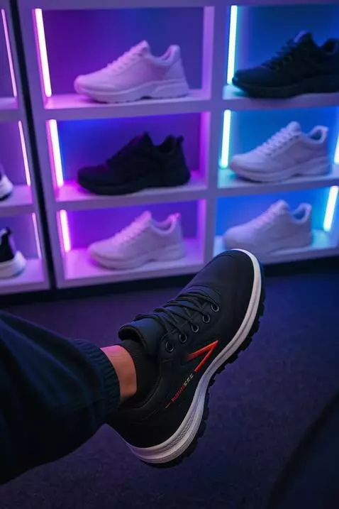 AI Video from prompt: Sepatu tersebut digerakkan dengan kakinya seolah