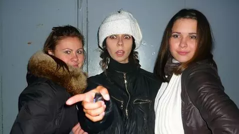 AI Video from prompt: The young woman in the middle is surprised by wh