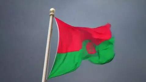 AI Video from prompt: A Bangladeshi flag flying proudly in heavy rain 