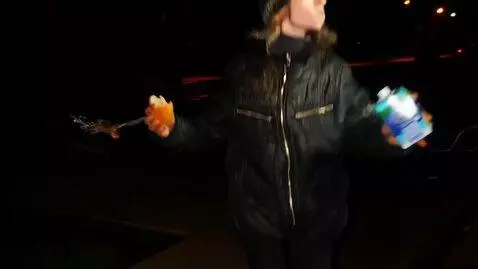 AI Video from prompt: She walks forward and dances a strangely jerky d