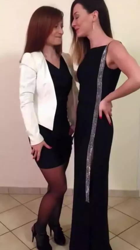 AI Video from prompt: Two women kiss sensually,