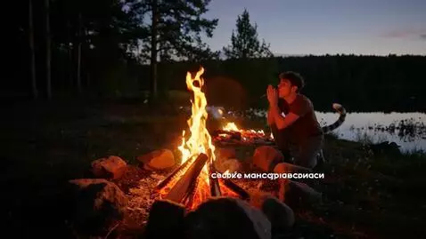 AI Video from prompt: Action (8s): At dusk near a forest lake, a male 