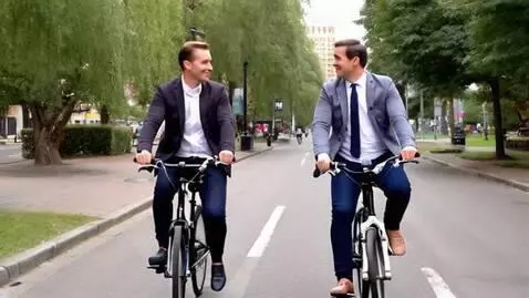 AI Video from prompt: "Vladimir Putin and Volodymyr Zelensky riding bi
