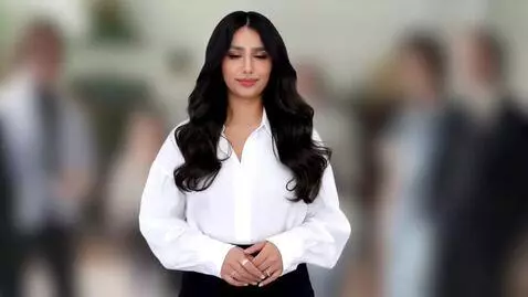 AI Video from prompt: A young woman with very long, wavy black hair, s