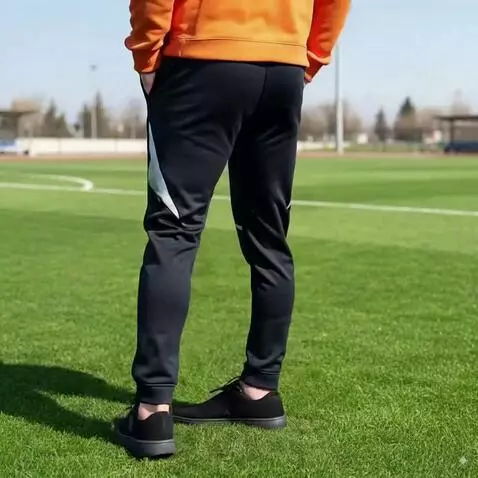 AI Video from prompt: A male model wearing stylish black jogger pants 