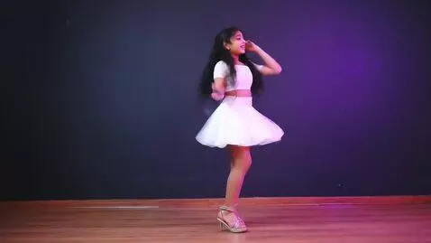 AI Video from prompt: Armenian Girl with black hairs in white mini ski