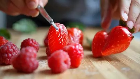 AI Video from prompt: make a video with sound of people cutting glass 