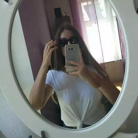 AI Video from prompt: The woman takes off her