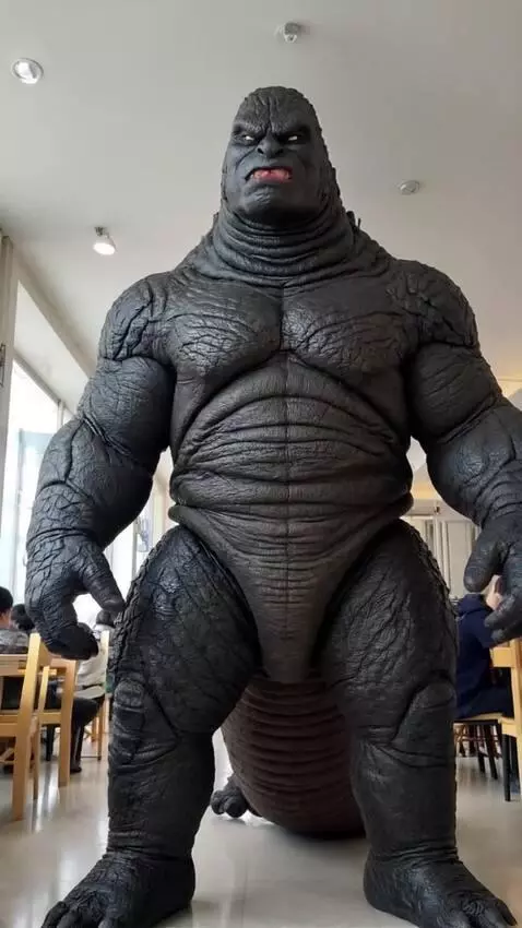 AI Video from prompt: the boy change to be a gozila