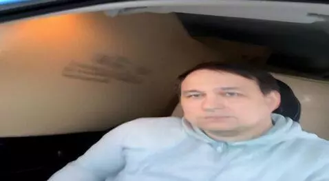 AI Video from prompt: Camera moves goes right showing how the man on t