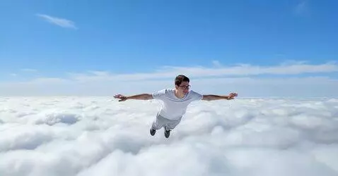 AI Video from prompt: Юноша летит над облаками