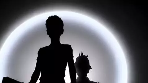 AI Video from prompt: Triumph Image:  Wide low-angle: the boy stands s