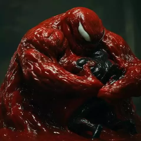 AI Video from prompt: The red blob hugs and absorbs Venom into it