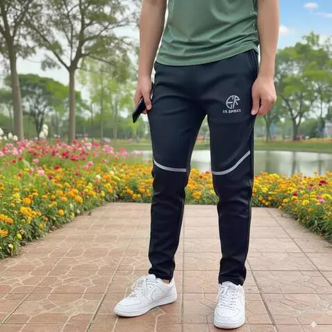 AI Video from prompt: A man in the park showcasing black training pant