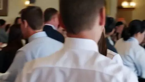 AI Video from prompt: A waitress with a frothy coffee runs through the