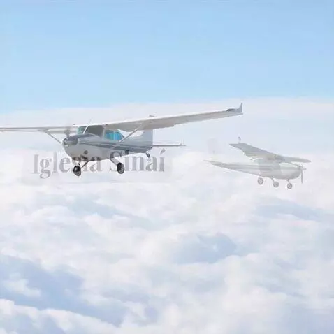 AI Video from prompt: small plane flying above the clouds
