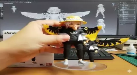 AI Video from prompt: "Two hands gently pick up the figure in the fram