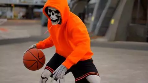 AI Video from prompt: skeleton with angry face wearing orange hoodie a