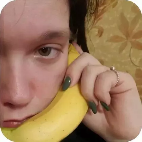 AI Video from prompt: woman speaking to banana phone, realistic, film 