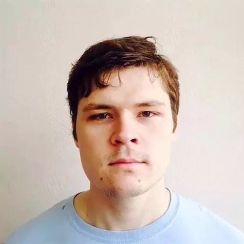 AI Video from prompt: The clothes of the man on the photo change to an