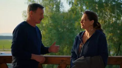 AI Video from prompt: We stood on the old wooden balconies of a Soviet