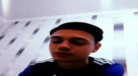 AI Video from prompt: Сделай что бы он облизывал мороженое языком плав