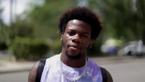 AI Video from prompt: I need imagine to rap along to the lyrics “free 