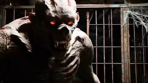 AI Video from prompt: The monster takes three heavy steps straight int