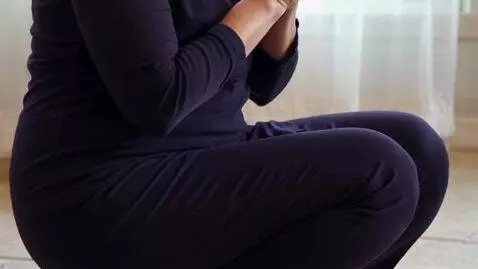 AI Video from prompt: A video of me knelt down while praying