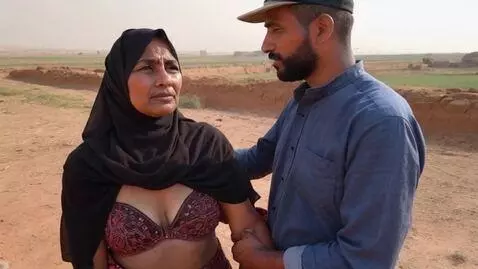 AI Video from prompt: Natural rural Egyptian beggar female mature wear