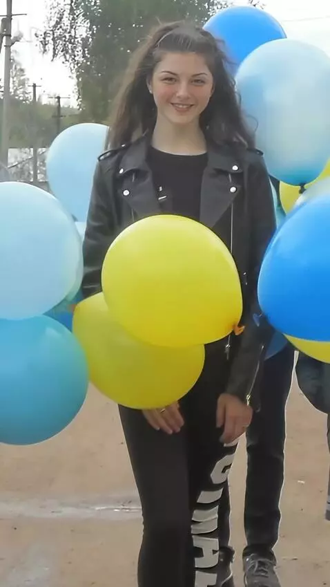 AI Video from prompt: the balloons fly out of the frame, and the girl 