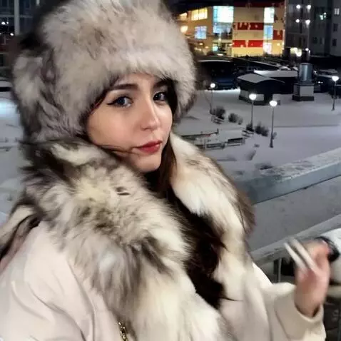 AI Video from prompt: a man has trained a polar bear and is petting it