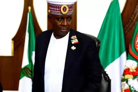 AI Video from prompt: Create a video of  Nigeria's president handing o