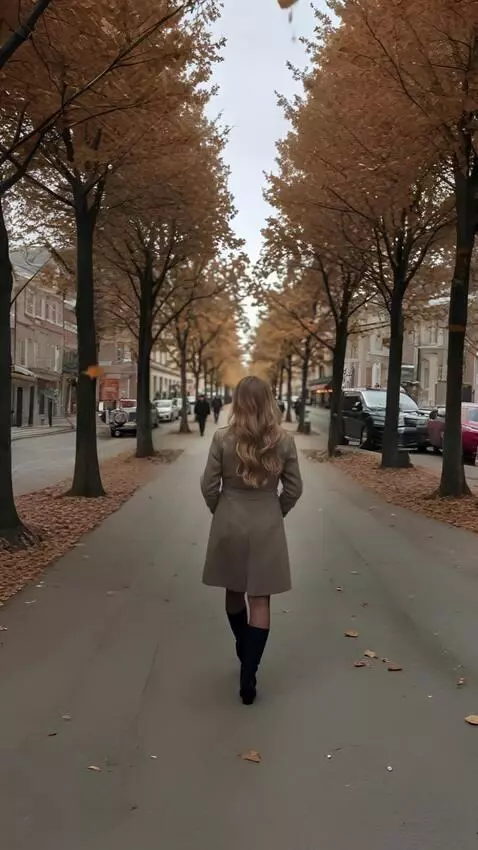 AI Video from prompt: the girl is walking away from the camera, leaves