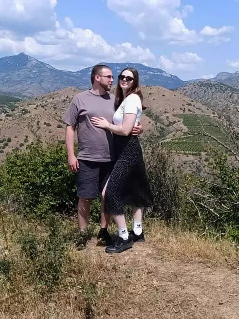 AI Video from prompt: Оживи фото не меняя наших лиц, сделай романтично