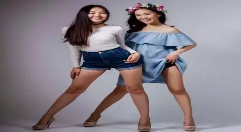 AI Video from prompt: Belly dance in black bikini, smeared in milk