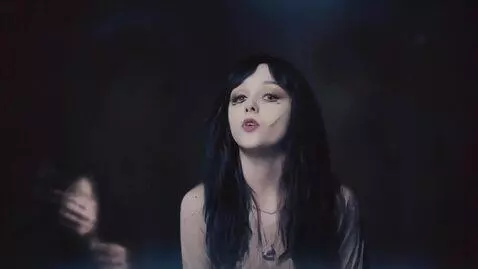AI Video from prompt: A gothic indie rock band with a cute pretty girl