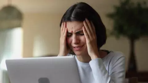 AI Video from prompt: 🎥 Opening Scene (3s) Person working on laptop, h